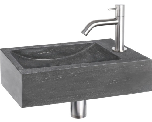 Wastafel van steen met kraan