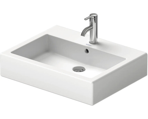 Wastafel van keramiek met kraan