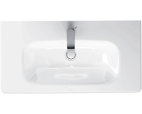 Bovenaanzicht van een wastafel met kraan