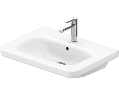 Witte wastafel van keramiek met kraan