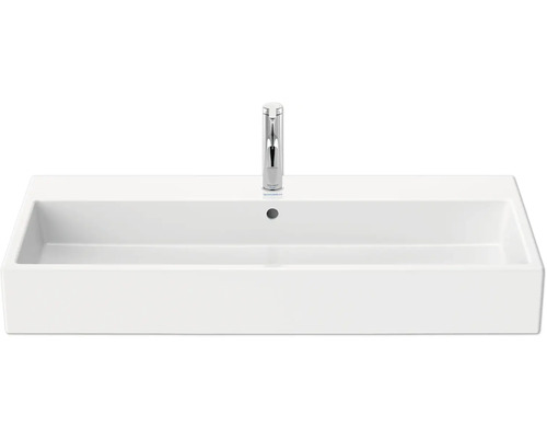 Wastafel van keramiek met kraan