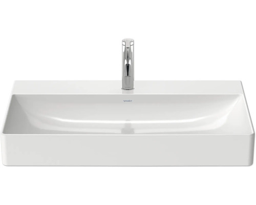 Rechthoekige waskom van sanitair keramiek met kraan