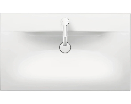 Afbeelding van een keramische wastafel met kraan