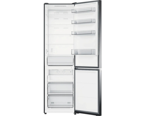 Geopende koelkast met planken en lades