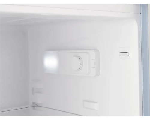 Interieur van een koelkast met temperatuurregelaar