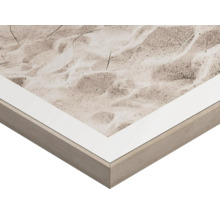 Detail van een ingelijste afbeelding met strandmotief