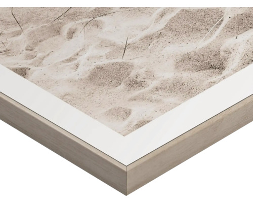 Detail van een ingelijste afbeelding met strandmotief