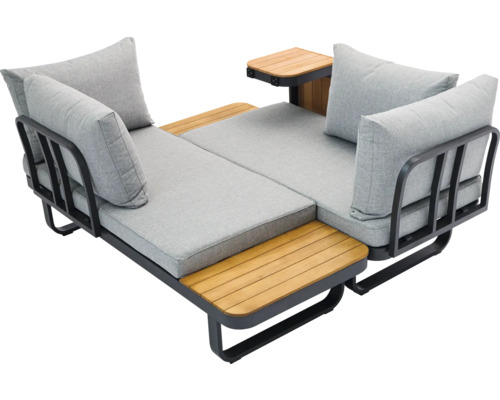 Tuin loungebank met grijze kussens en bijzettafel