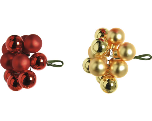Decoratieve kerstballen in rood en goud