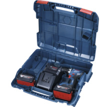 Geopende blauwe gereedschapskoffer met accuschroefboormachine, accu en oplader