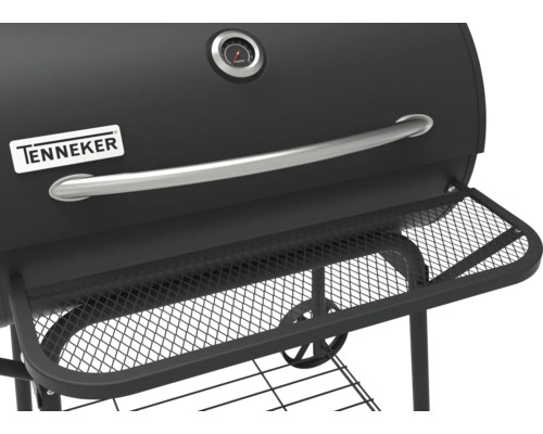 Detailaanzicht van de Tenneker houtskoolgrill met temperatuurweergave, handgreep en opbergrek