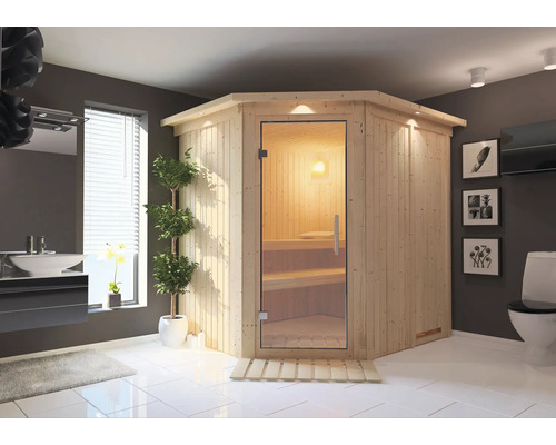 Houten hoeksauna met glazen deur in een badkamer.