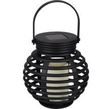 Zwarte solarlantaarn met handvat en kaars