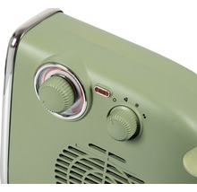 Gedetailleerde weergave van een kachel met draaiknoppen voor temperatuur- en vermogensregeling.