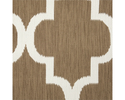 Detailopname van een tapijt met geometrisch patroon