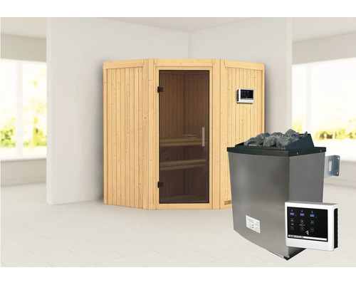 Sauna met kachel en saunastenen in een lichte ruimte