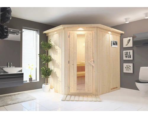 Interieurfoto met een houten sauna, wastafel en toilet in een badkamer