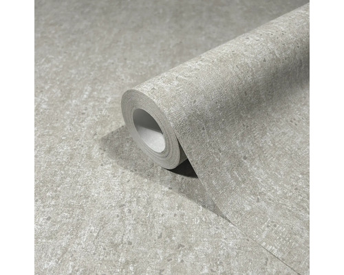 Een rol vinylbehang met steendecor.
