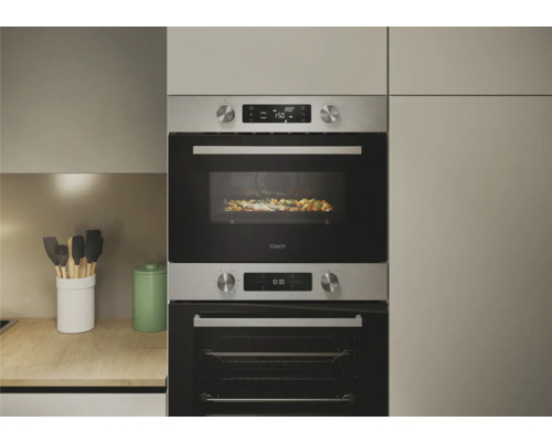 Inbouw oven en magnetron van Candy in een moderne keukenopstelling.