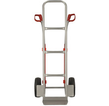 Metalen steekwagen met twee wielen en rode handgrepen