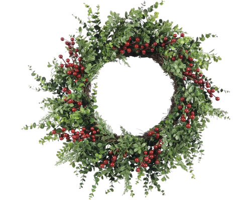 Decoratieve deurkrans met bessen en planten