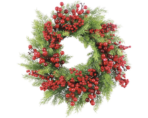 Decoratieve krans met bessen en dennennaalden als feestelijke decoratie
