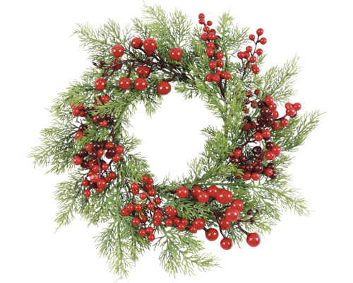 Decoratieve deurkrans met bessen en dennentakken voor de kersttijd