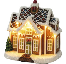 Peperkoekhuis met verlichting en decoratie