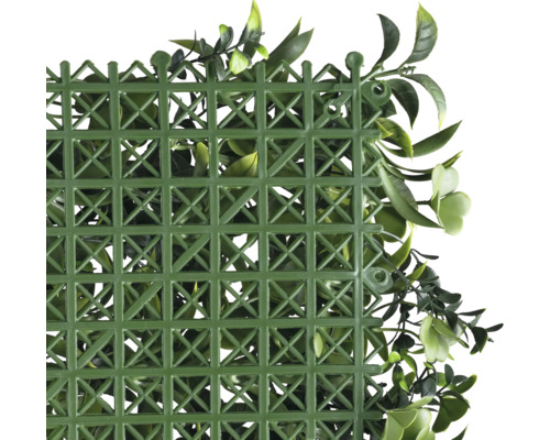 Groene plantenmat met kunststof raster