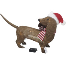 Decoratief teckelbeeldje met kerstmuts en sjaal