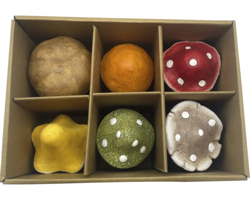 Decoratieve speelstukken in kartonnen verpakking