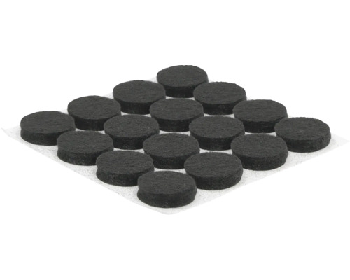 Meerdere meubelglijders van vilt op een ondergrond