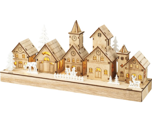 Decoratieve houten winterdorpsscène met verlichting