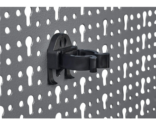 Gereedschapswand met buisklem voor gereedschapsopslag