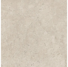Close-up van een beige vloertegel met gemarmerde textuur