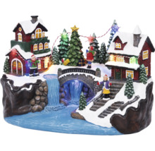 Kerstdecoratie met huizen, brug, waterval, bomen en figuren