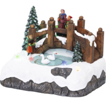 Decoratief winterlandschap met brug, figuren en zwanen voor een feestelijke sfeer