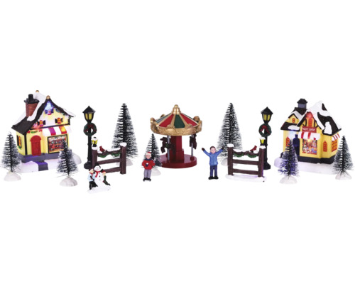 Kerstdorp scène met draaimolen, huizen, figuren en bomen