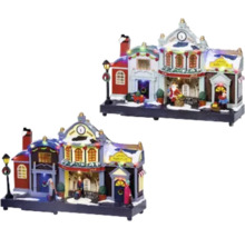 Twee decoratieve kerstdorp miniaturen met verlichte huizen en figuren