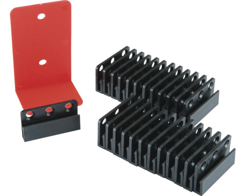 Meerdere zwarte en één rode kunststof afstandhouder