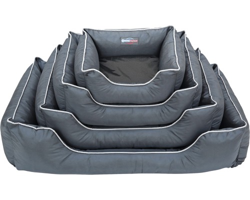 Gestapelde hondenmanden in verschillende maten met witte rand