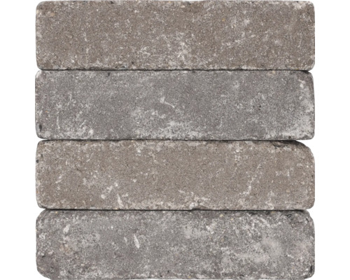 Vier grijze straatklinkers