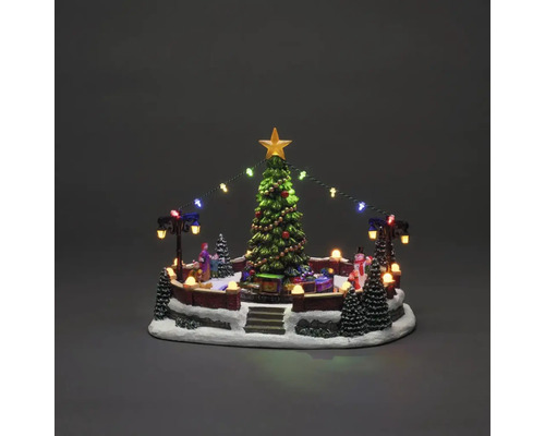 Kerstdorp met kerstboom, figuren, verlichting en decoratie