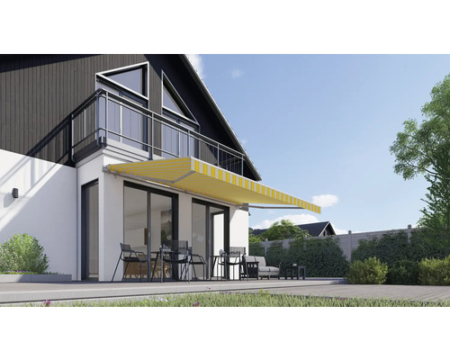 Huisaanzicht met uitgeschoven zonnescherm en terrasmeubilair