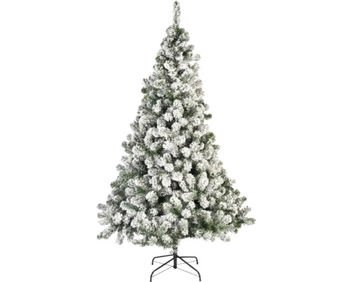Sneeuw bedekte kunstmatige kerstboom op een standaard