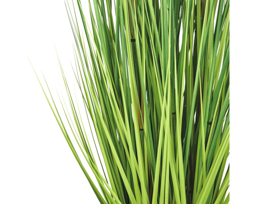 Kunstmatig grasbundel met groene halmen en bamboestokken als decoratie