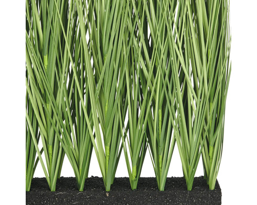 Kunstgrassen in een rij geplant