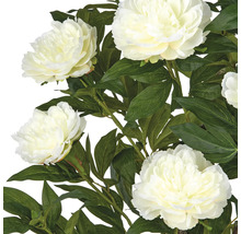 Kunstbloemen met witte bloemen en groene bladeren.
