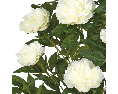 Kunstbloemen met witte bloemen en groene bladeren.