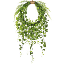 Decoratieve deurkrans met varen en klimopbladeren